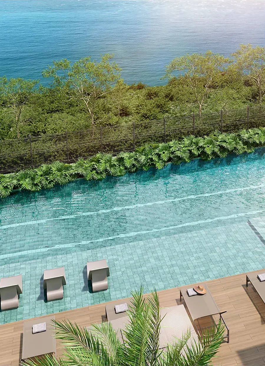 Piscina do Breeze com a mata e a Lagoa de Jacarepaguá ao fundo